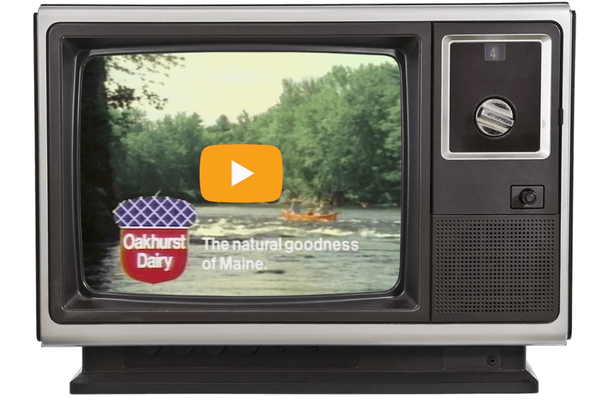 https://www.oakhurstdairy.com/wp-content/uploads/2021/02/milestone-1970-canoeing-VIDEO@2x.png